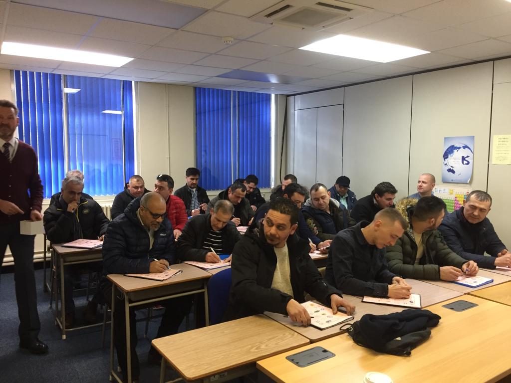 A full classroom of drivers in a training session at London Paragon College